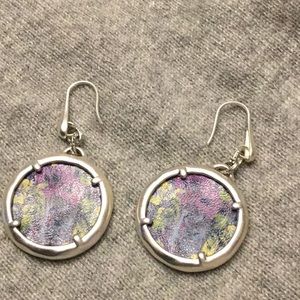 Woman’s Patricia Nash earrings. Silver and floral.